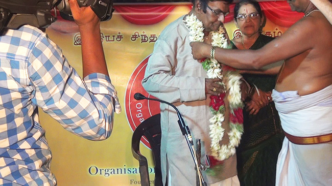 D.A.Joseph honoured by Mylapore Srininivasa Perumal temple Prasatham and Maalai. 